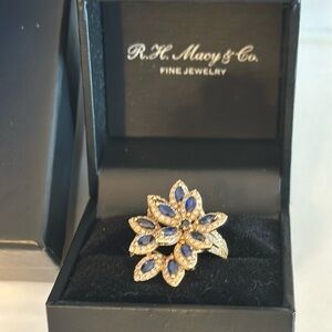 Effy 14 karat gold blue sapphire leaf ring.